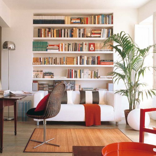 living library shelves behind furniture sofa bookshelves bookcases space organize books placement shelterness putting saving built sofas