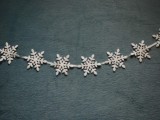 Easy And Cheap DIY Snowflake Christmas Garland