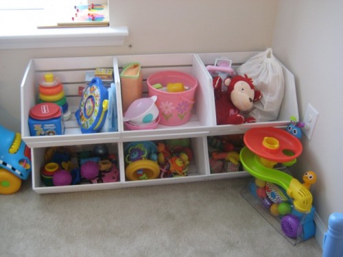 In case you doesn't want to spend money on a Pottery Barn toy storage solution you can made it from veggie trays for cheap! (via leafandletterhandmade)