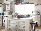A plate rack set in a kitchen island