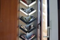IKEA LACK shelves hanged in a V-shape could serve as a creative shoe display
