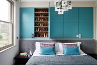 contemporary turquoise built-in is in interestin space saving solution for a bedrrom that features storage for lots of things