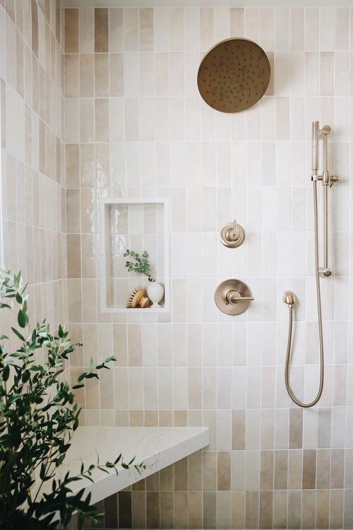 a small matching niche next to the shower space is a great idea for a bit of decor, it will add interest to the bathroom