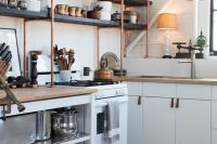 copper and wood open shelves are great additions to standard IKEA kitchen cabinets