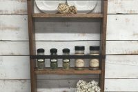 kitchen wall shelf that acts as a spice rack