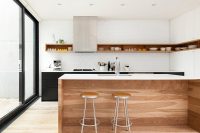 super stylish wall shelf that looks well on this minimalist kitchen