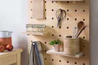 wall mounted kitchen shelves are very versatyle when you put them on a pegboard