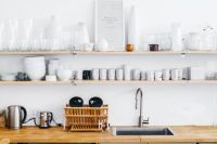 wall shelves could fit well a minimal kitchen design