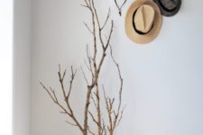 a cool decoration made of concrete and some natural branches is all about nature and is simple to DIY