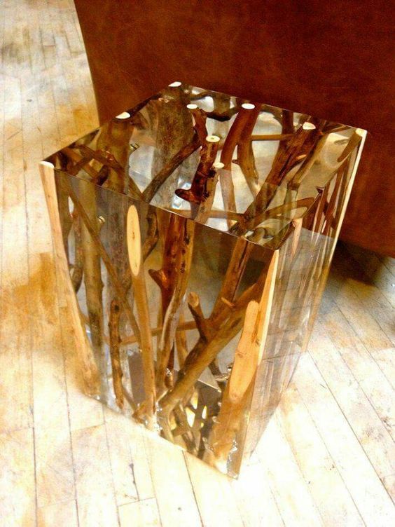 a-stylish-modern-side-table-of-branches-placed-in-glass-is-a-chic-and-bold-idea-for-any-space.jpg