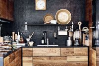 black works so well with rustic wood on this gorgeous yet compact kitchen