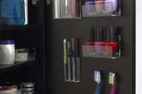 clever organization of space inside cabinets is very important in a tiny bathroom