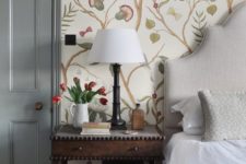 floral and bird print wallpaper is a whimsical idea for a neutral or pastel bedroom