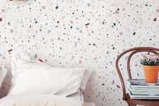 terrazzo print wallpaper is a fresh and trendy idea for a bedroom, it brings an edgy feel to the space
