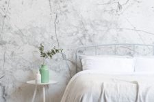 white marble wallpaper is a trendy touch and a chic idea to spruce up your bedroom in a chic modern way