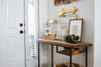 ikea desk turned into a farmhouse-style rough console table that could fit any entryway well