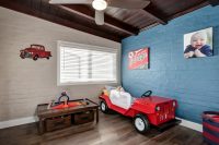 lovely red car bed for a little boy