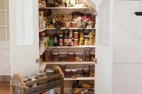 pantry could occupy the space under the stairs