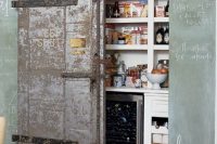 vintage sliding door could be a focal point of your kitchen while hiding your pantry