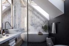 a monochromatic attic bathroom with skylights, neon lights, an oval tub and floating vanity and a mirror