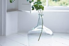 a neutral bottle with eucalyptus is a cool decoration to make your space welcoming and very cool