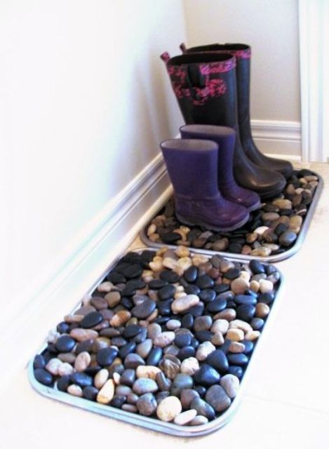pebbles placed into the trays for shoes and boots is a cool way to add a natural feel to them and make their look cooler
