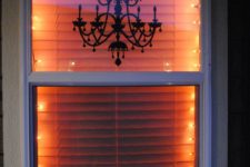 25 ideas to decorate windows with silhouettes on halloween