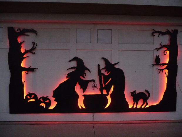Garage door could also be covered with Halloween silhouettes. Would take your yard's decor to the next level.