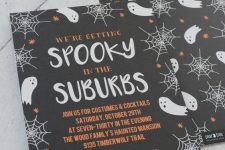 super cool modern Halloween party invitations in black, white and orange, with ghosts and spider webs