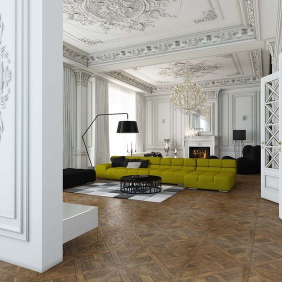unique vintage molding with medallions is continued to the walls and together with a crystal chandelier create a fantastic look