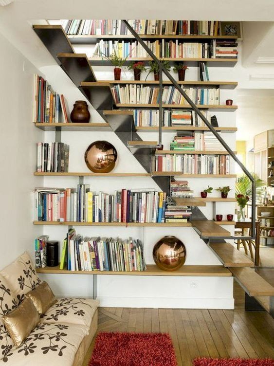 open shelves and an airy staircase make a cool modern combo and you can easily store all the books you want