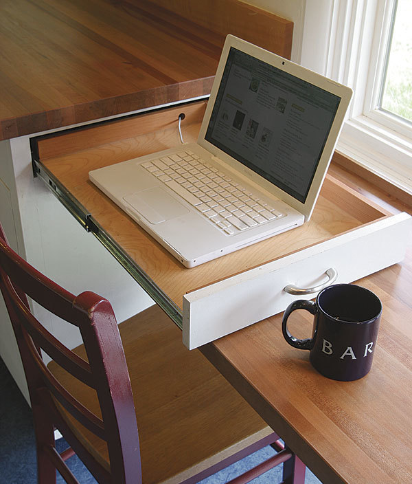 you can even have a laptop drawer on your kitchen