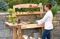 functional gardening bench with shelves