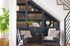 a dark built-in bookcase and a couple of dark chairs to form a reading nook easily and without taking much space