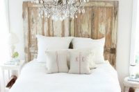 aged headboard is probably all you need to make your bedroom look chic