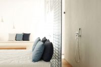 walk-in shower could be placed right behind a bed
