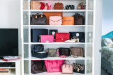 a glass armoire is a gorgeous way to store and display your designer bags and shoes, they will become part of home decor