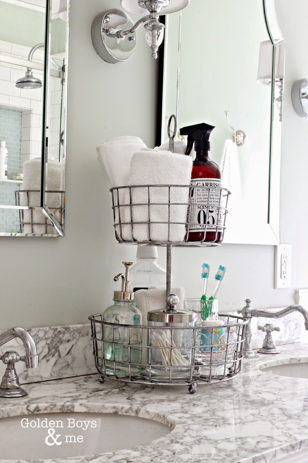 Metal baskets to organize toothbrushes on a washbasin