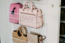 wire baskets attached to a closet door is a great idea to store smaller bags and clutches and they look pretty in there