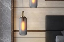 black frosted pendant lamps shaped as long jars and with copper touches for a chic look