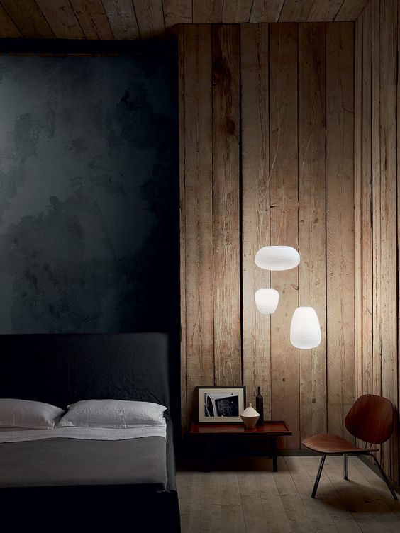 these modern floating pendant lamps remind of clouds going over the bed