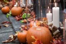 fall wedding aisle decor with leaves, pumpkins, candles and wine corks is easy to recreate