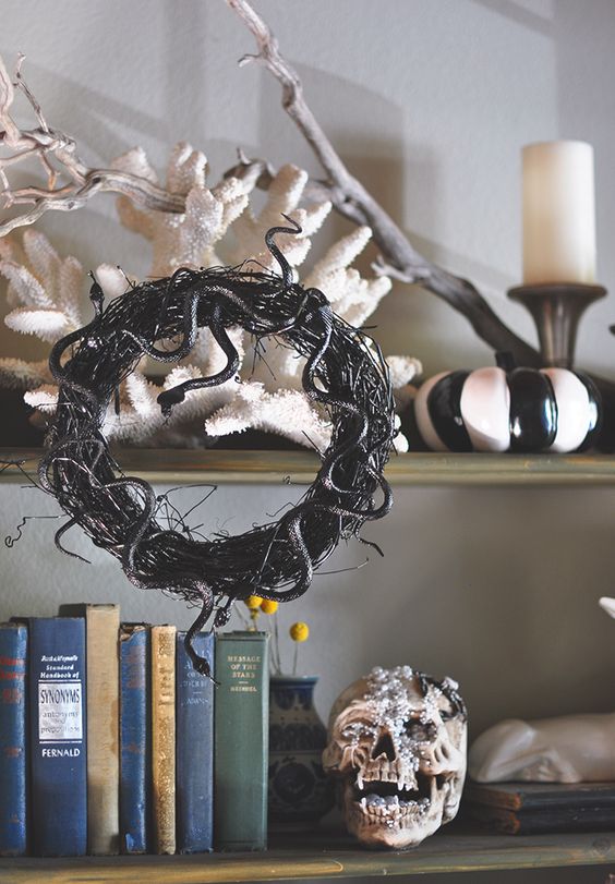 a vine and black snake Halloween wreath is a timeless and cool decoration for this spooky holiday
