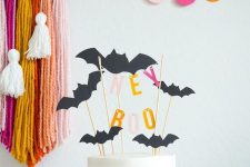 bats on the wall and bat cake toppers are nice for Halloween decor
