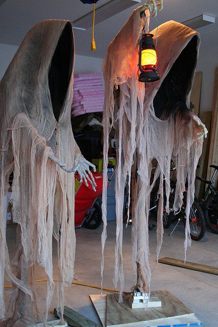 cloaked ghosts with a lantern are fantastic decorations for indoors and outdoors, use them for Halloween