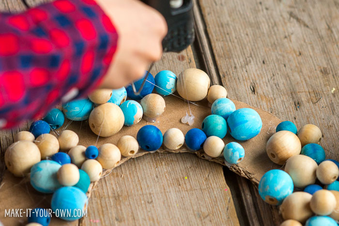 DIY Winter Wooden Bead Wreath To Make With Kids