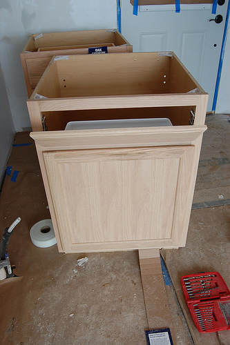 DIY sink base of a regular cabinet (via diydiva)