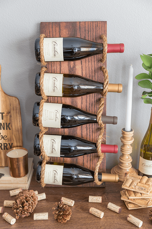Picture Of chic diy rustic wine rack with rope  2