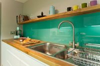 DIY turquoise glass backsplash