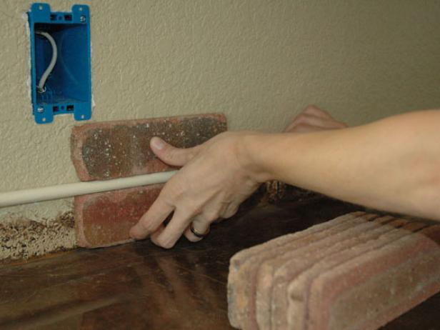 DIY brick backsplash installation (via diynetwork)